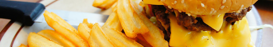 Eating Burger at Famous Hamburger - Dearborn restaurant in Dearborn, MI.